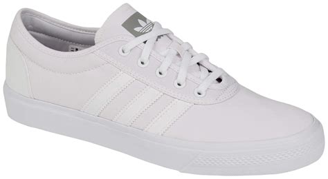 adidas schoen wit|Adidas white canvas shoes.